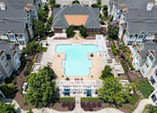 Thumbnail 56 of 56 - Fenwyck Manor's lushly landscaped pool and sundeck area