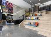 Thumbnail 6 of 42 - stairs and bench stairs with cushions in lobby at Lake Nona Pixon, Orlando, 32827