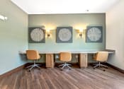 Thumbnail 11 of 57 - a conference room with a long table and chairs and paintings on the wall