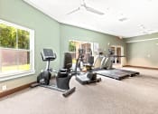 Thumbnail 7 of 57 - the gym has plenty of cardio equipment and a large window