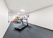 Thumbnail 11 of 12 - Horicon School fitness center with cardio equipment and free weights