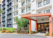 Thumbnail 14 of 18 - Front entrance drive to Orlando Cloisters Senior Apartments at 757 S Orange Ave, Orlando, FL 32801