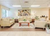 Thumbnail 1 of 18 - large lobby with comfortable sofas, modern flooring, large windows, and overhead lighting