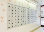 Thumbnail 5 of 18 - Resident mailboxes inside at Orlando Cloisters Senior Apartments