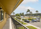 Thumbnail 37 of 37 - the view of the parking lot from the balcony of a apartment building