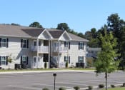 Thumbnail 18 of 18 - Large parking lot in front of Southbrook Apartment buildings