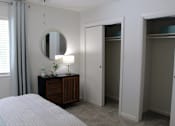 Thumbnail 21 of 30 - two double closets in bedroom with plush carpeting  at Huntsville Landing Apartments, Huntsville, Alabama