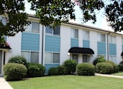 Thumbnail 2 of 30 - upgraded apartment homes with fresh paint, lush landscaping, and awnings over doors  at Huntsville Landing Apartments, Alabama