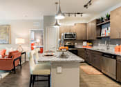 Thumbnail 13 of 30 - large open concept kitchen with eat-in island