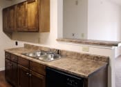 Thumbnail 6 of 18 - upgraded kitchen with stainless steel sink and granite look counters