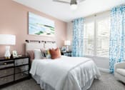 Thumbnail 24 of 40 - the preserve at ballantyne commons apartments bedroom with bed and windows