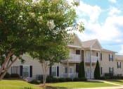 Thumbnail 1 of 18 - lush crepe myrtles outside Southbrook Apartments