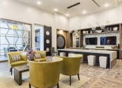 Thumbnail 6 of 44 - Lounge beside demonstration kitchen at Residences at The Green in Bradenton, FL 34211