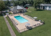 Thumbnail 4 of 19 - an aerial view of a swimming pool with a house in the background  at The Madison Franklin, Franklin, Tennessee