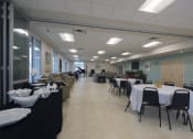 Thumbnail 16 of 35 - Mount Carmel Gardens senior apartments in jacksonville, florida community room with dining area