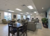 Thumbnail 17 of 35 - Mount Carmel Gardens senior apartments in jacksonville, florida community room with grand piano