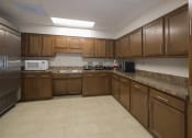 Thumbnail 20 of 35 - Mount Carmel Gardens senior apartments in jacksonville, florida spacious community kitchen