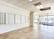 Thumbnail 10 of 12 - large bank of mailboxes on walls in lobby of Morris Manor Apartments
