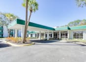 Thumbnail 1 of 12 - Drive up covered entrance at Morris Manor Apartments in Jacksonville