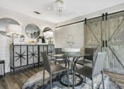 Thumbnail 11 of 32 - Dining Area at The Oasis Apartments, Daytona Beach