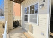 Thumbnail 21 of 24 - a porch outside an apartment at Algonquin Manor Senior Apartments for rent