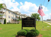 Thumbnail 3 of 18 - Southbrook Apartments entrance signage and American Flag