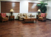 Thumbnail 9 of 18 - nice sitting area with couch, chairs, and lamps at B'nai B'rith I, II, & III apartments in deerfield beach