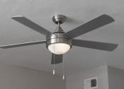 Thumbnail 27 of 32 - Modern, metal ceiling fan with central light at Terraces at Clearwater Beach at Terraces at Clearwater Beach, Clearwater