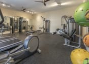 Thumbnail 8 of 32 - Cardio and yoga equipment in fitness center at Terraces at Clearwater Beach, Clearwater, 33756
