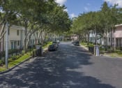 Thumbnail 31 of 32 - Neat street and open gates at entrance at Terraces at Clearwater Beach, Florida