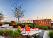Thumbnail 39 of 42 - Chairs surrounding fire pit on amenity deck at Pixon at Lake Nona Pixon, Florida, 32827