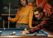Thumbnail 7 of 8 - men and women playing pool togehter