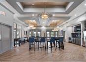 Thumbnail 11 of 57 - a large dining room with a large table and chairs