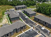 Thumbnail 49 of 57 - an aerial view of a group of buildings and roads