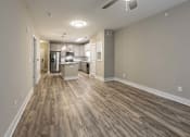 Thumbnail 101 of 197 - A kitchen area with a refrigerator, microwave, and oven at Foxwood Apartments, Raleigh-Durham, North Carolina