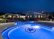 Thumbnail 141 of 197 - A swimming pool with a diamond logo in the middle of it. at Foxwood Apartments, Raleigh-Durham, 27616