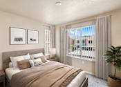 Thumbnail 22 of 24 - bedroom with a large window at Desert Eagle Estates, Arizona 