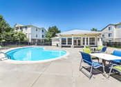 Thumbnail 8 of 25 - Swimming Pool with Lounge Seating on Sun Deck