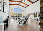 Thumbnail 17 of 33 - the preserve at ballantyne commons community room with tables and chairs