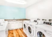 Thumbnail 12 of 25 - Clothing Care Center with Washers and Dryers