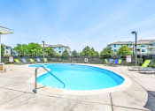 Thumbnail 6 of 25 - Swimming Pool with Lounge Seating on Sun Deck