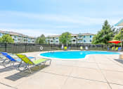 Thumbnail 5 of 25 - Swimming Pool with Lounge Seating on Sun Deck