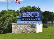 Thumbnail 36 of 39 - a sign with an american flag in the background