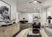 Thumbnail 10 of 39 - an open concept living room and dining room with a kitchen in the background