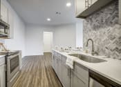 Thumbnail 19 of 39 - Fully Equipped Kitchen at 3500 Westlake Apartments, Greystar Real Estate, Austin, 78746