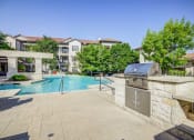 Thumbnail 22 of 39 - Poolside Grill Station at 3500 Westlake Apartments, Greystar Real Estate, Austin