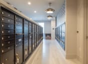 Thumbnail 12 of 58 - a long hallway with many lockers in a room
