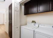 Thumbnail 24 of 44 - our apartments have a spacious laundry room with a washer and dryer