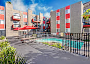 Thumbnail 3 of 17 - our apartments have a pool and a patio with tables and umbrellas