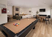 Thumbnail 5 of 36 - A pool table is in the middle of a living room.
